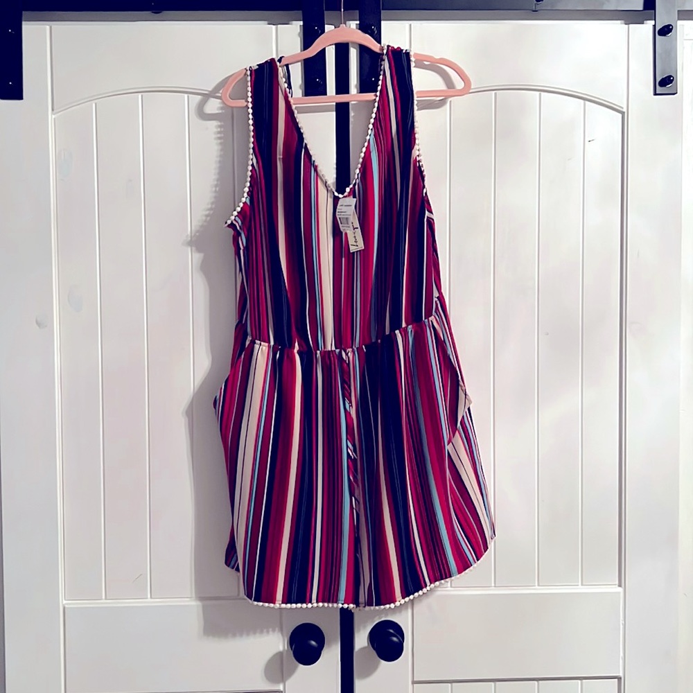 New with Tags.  Never worn.  Romper with pockets. Cleaning out my closet.